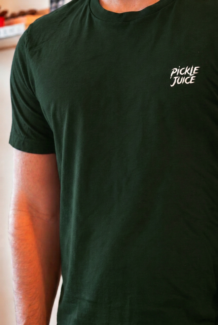Forest-green shirt revision targeting hex #223e25